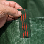 Close up of the reinforced striped webbing carry handle